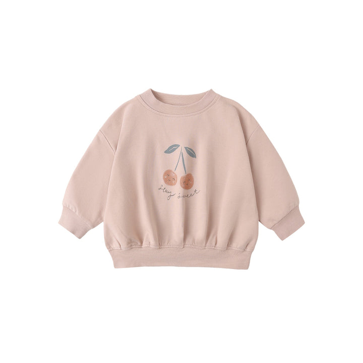 Pink sweatshirt with cherry design on a white background
