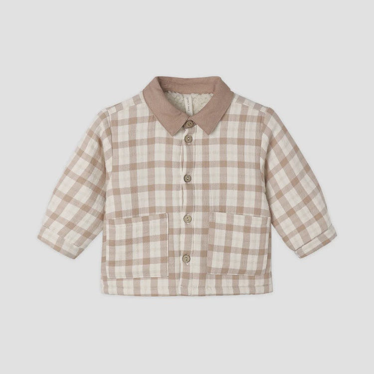 A toddler's long-sleeve button-up shirt jacket featuring a beige and cream gingham plaid pattern, a solid beige collar, and front buttons, shown on a plain light gray background.