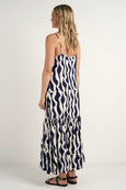 The Relax strappy tiered midi dress is a flowy, midi featuring a geometric wave pattern in navy and white available from www.thecollectivenz.com