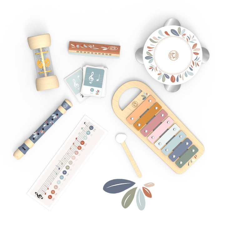 Collection of musical toys and educational items on a white background
