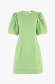 Feel ultra chic in the Emory apple green mini dress from Stories be Told, available from www.thecollectivenz.com