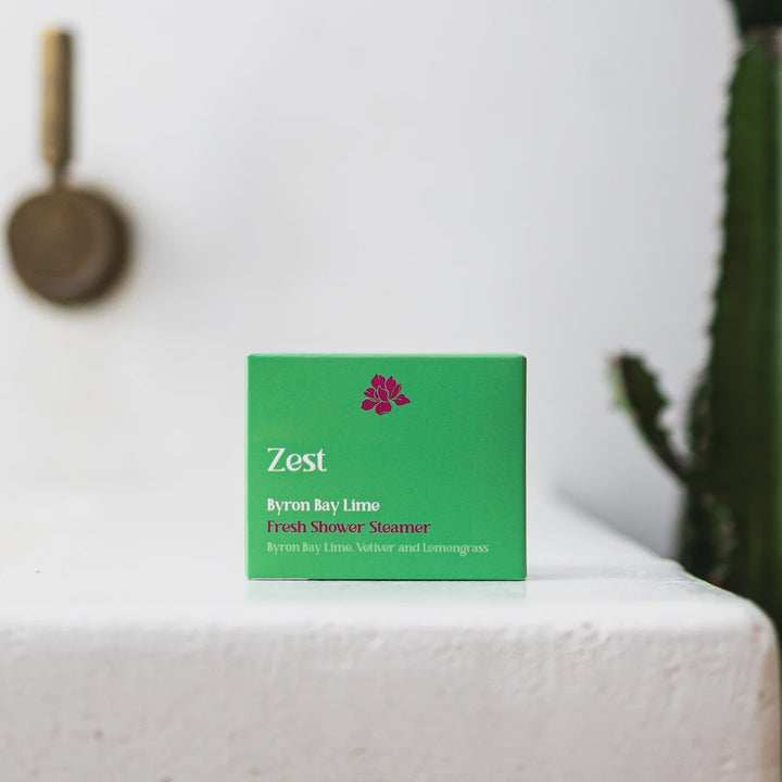 Green box labeled 'Zest' on a white surface with a blurred background