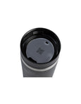 Black travel mug with a lid on a white background