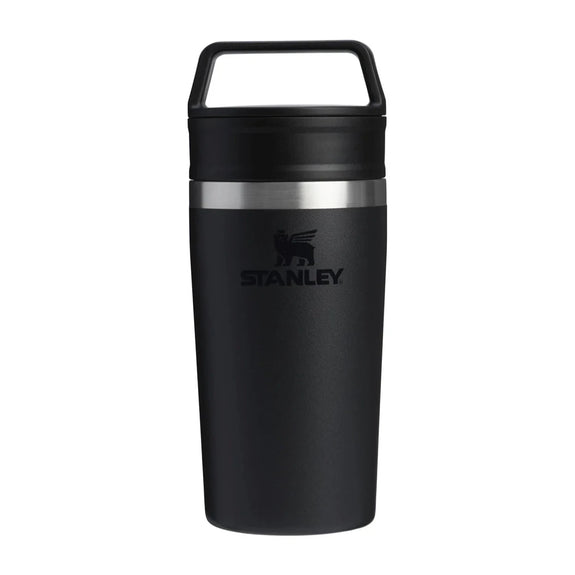 Black Stanley insulated mug with a handle on a white background