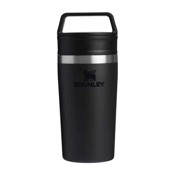 Black Stanley insulated mug with a handle on a white background