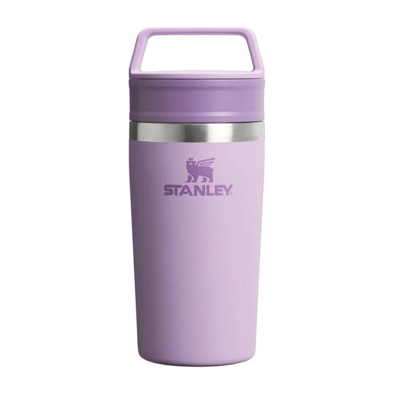 Purple Stanley tumbler on a white background