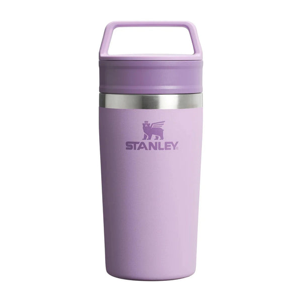 Purple Stanley tumbler on a white background