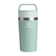 Light green Stanley tumbler on a white background