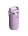 Purple Stanley tumbler on a white background