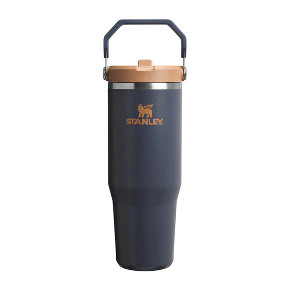 Blue Stanley insulated mug with a brown lid on a white background