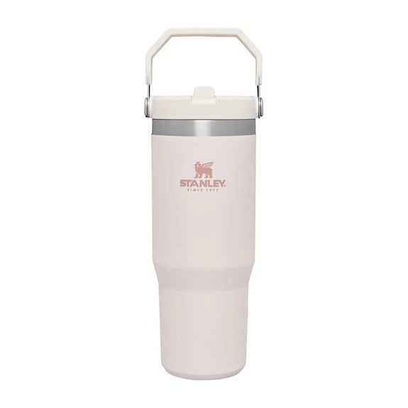 Blush Stanley tumbler with a handle on a white background