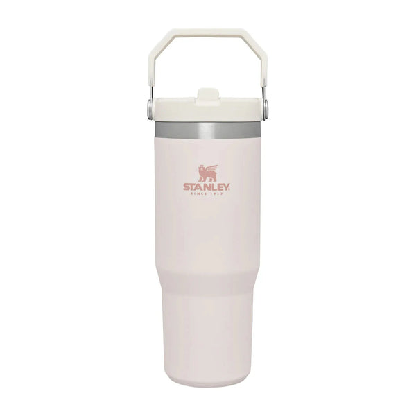 Blush Stanley tumbler with a handle on a white background