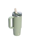 Mint green tumbler with handle and straw on a white background