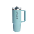 Light blue Stanley tumbler with handle on a white background
