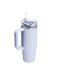 White insulated tumbler with handle and straw on a white background