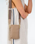 Elms  & King Sullivan phone bag has a top zipper and features a cotton webbing crossbody strap adjustable to 140cm available from www.thecollectivenz.com