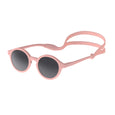 Pink sunglasses with a strap on a white background