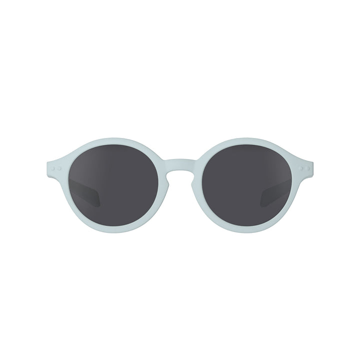 Sunglasses with round lenses and light gray frame on a white background