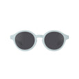 Sunglasses with round lenses and light gray frame on a white background