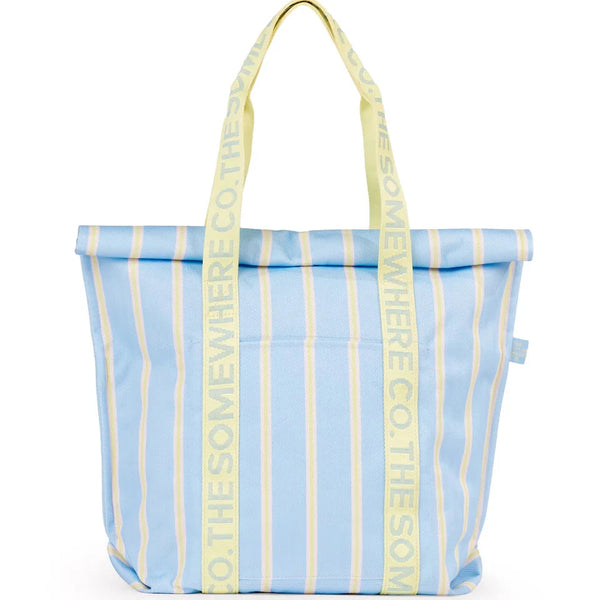 Blue and yellow striped tote bag with 'The Somewhere Co.' branding on a white background