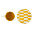 Mug with a checkered lid on a white background