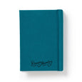 Teal notebook with 'Brass Monkey' branding on a white background