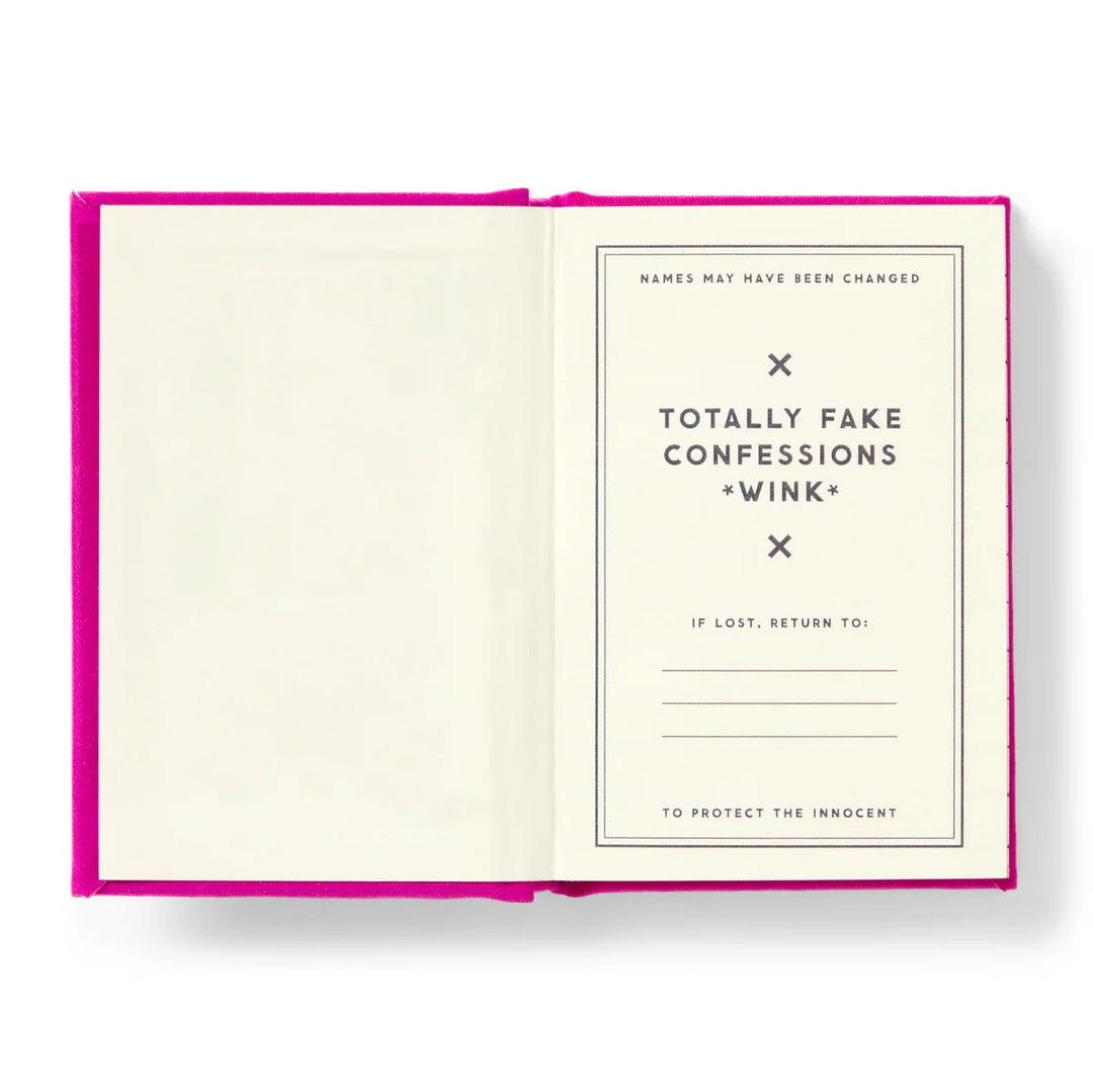 Open book with a pink cover and white pages displaying text.