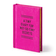 Pink diary with text on a white background
