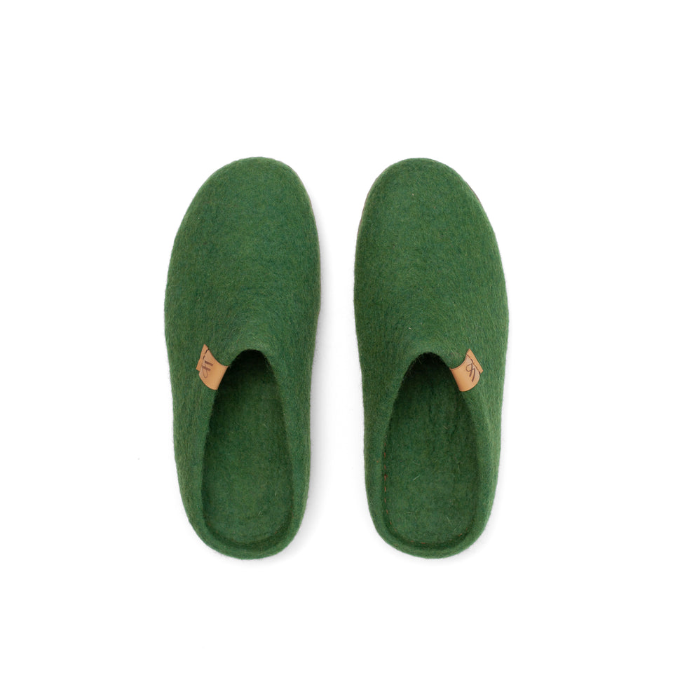 Woolfi Suffolk slippers feature modern and sleek in design our slip-on slipper is our most popular and versatile of our range. Warm and cosy for year-round comfort. Available from www.thecollectivenz.com