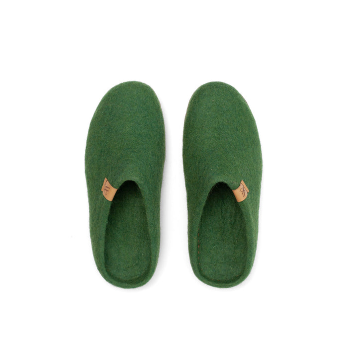 Woolfi Suffolk slippers feature modern and sleek in design our slip-on slipper is our most popular and versatile of our range. Warm and cosy for year-round comfort. Available from www.thecollectivenz.com