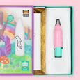 Pink and green drawing tool with Tiger Tribe branding in an open box on a pink background