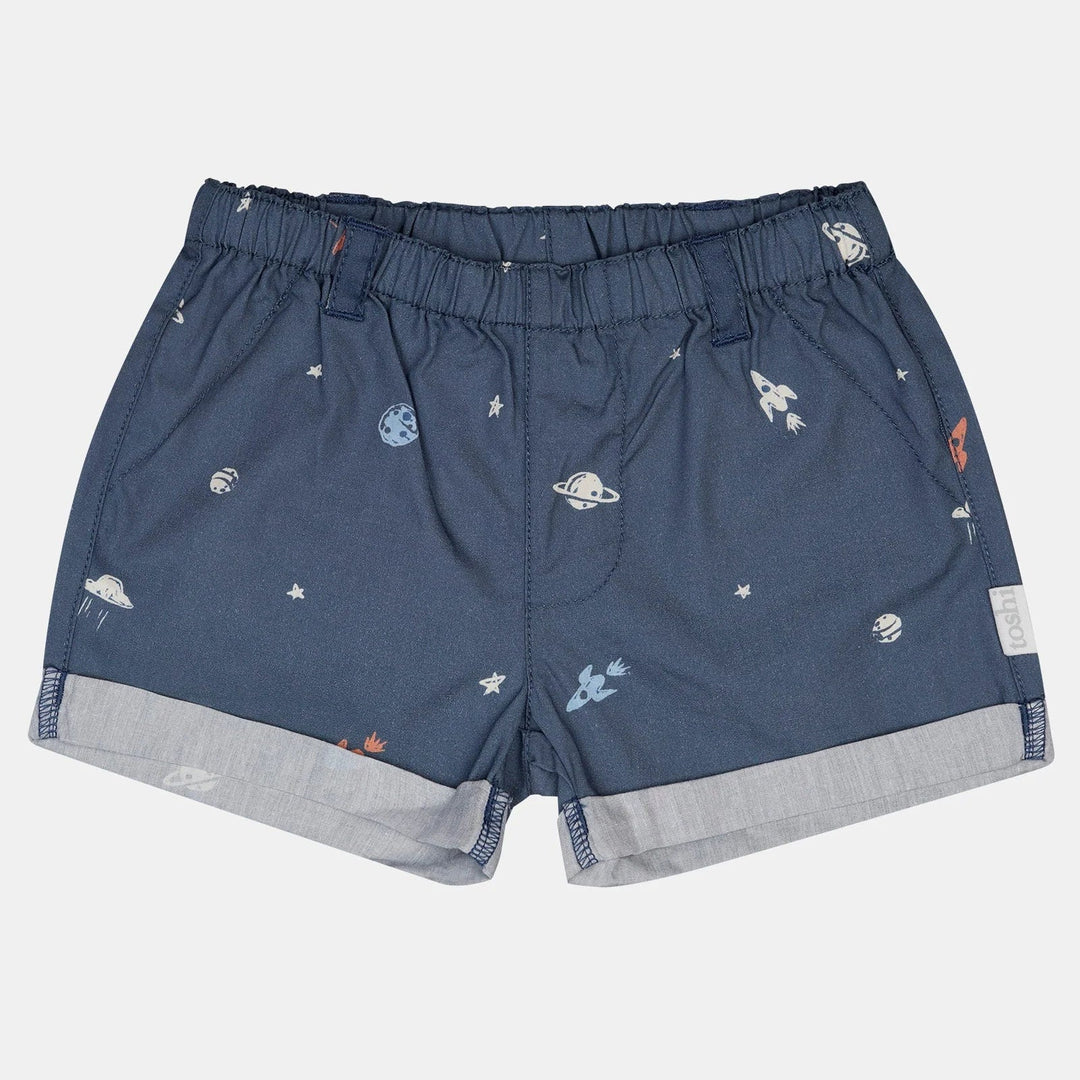 Blue shorts with space-themed print on a light gray background