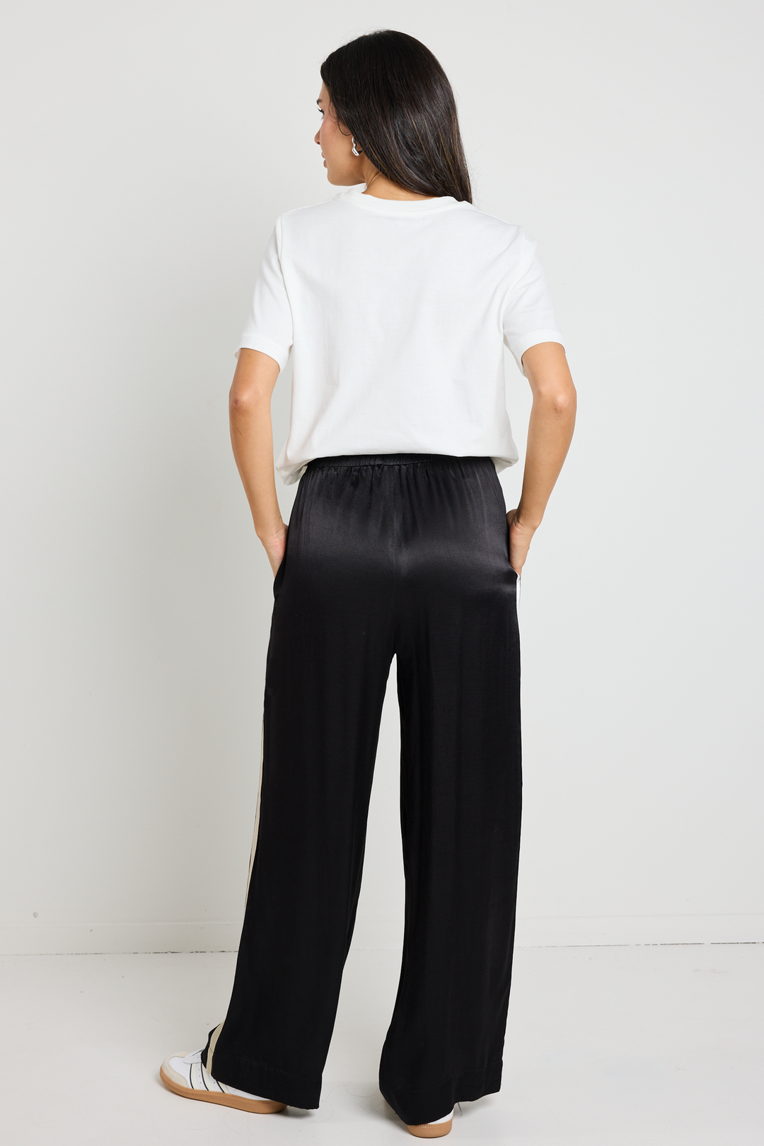 Upgrade your off-duty style with the Townie Black Satin Side Stripe Pants. Designed for ultimate comfort, available from www.thecollectivenz.com