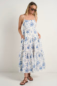 The fabulous Universe maxi dress. The delicate porcelain print, the tiered skirt and lace inserts offers a flattering look and fit. Available from www.thecollectivenz.com