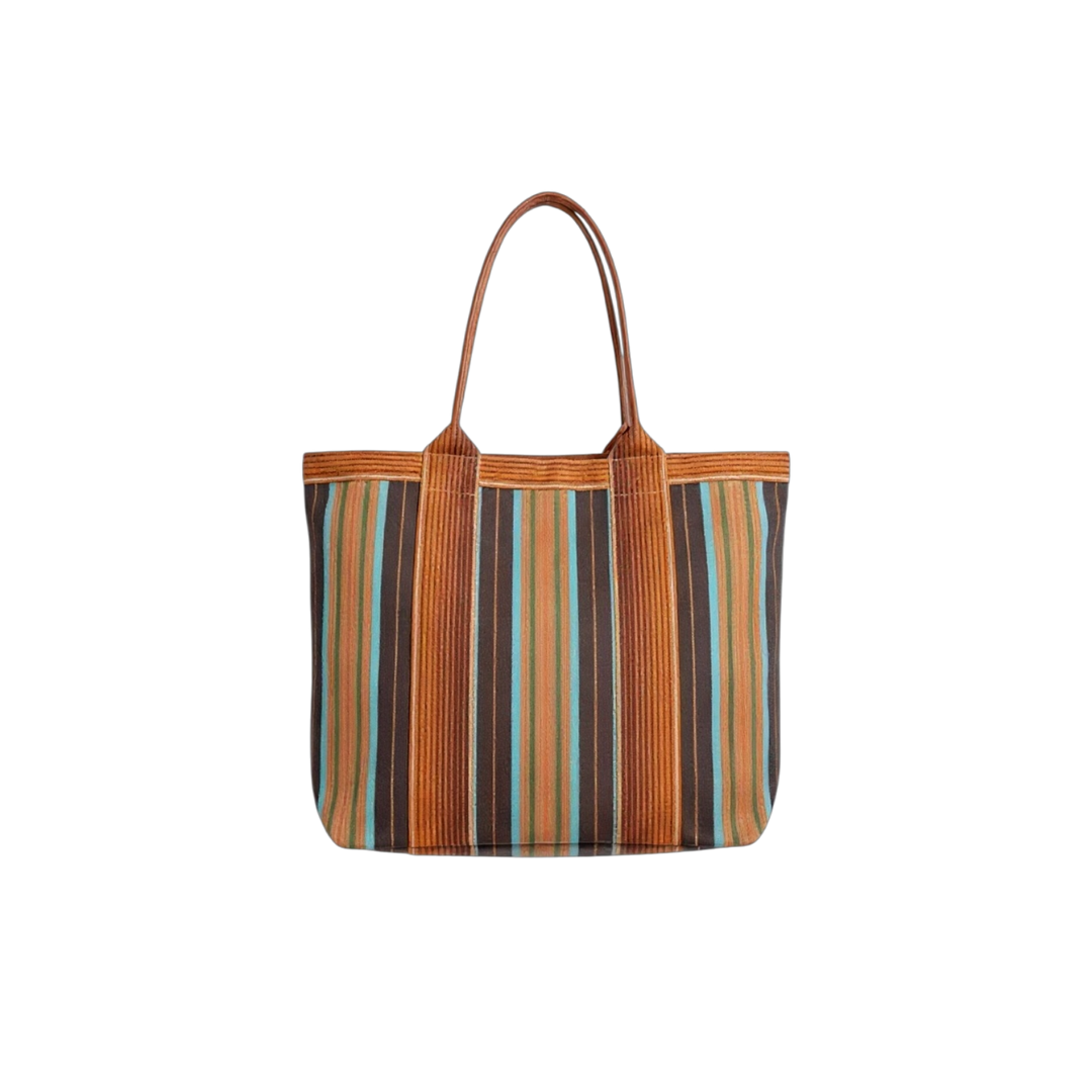 Striped tote bag with brown handles on a white background
