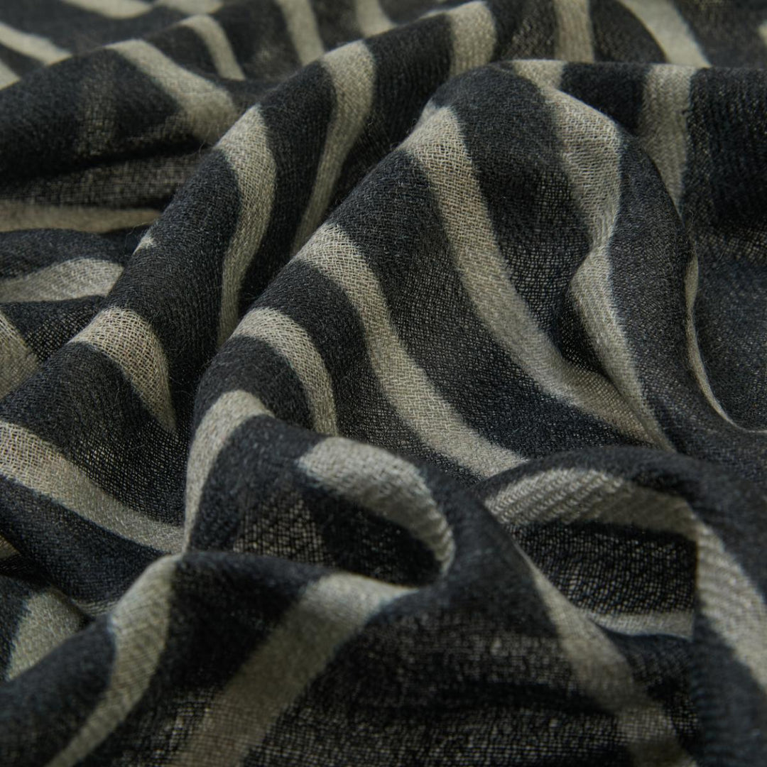 Wrap yourself in warmth with this ethically made in India Merino wool scarf. Available from www.thecollectivenz.com