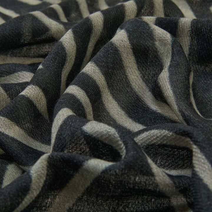 Wrap yourself in warmth with this ethically made in India Merino wool scarf. Available from www.thecollectivenz.com