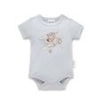 Light blue baby bodysuit with teddy bear and airplane design on a white background