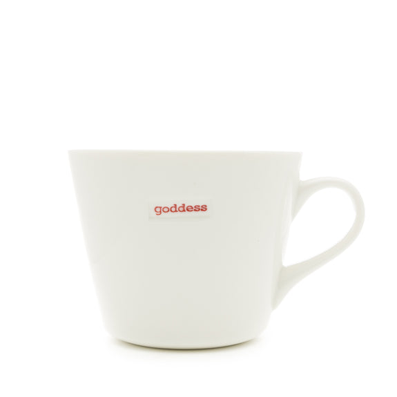White mug with 'goddess' text in red on a white background