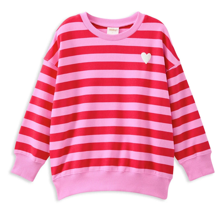 Pink and red striped sweater with a heart design on a white background