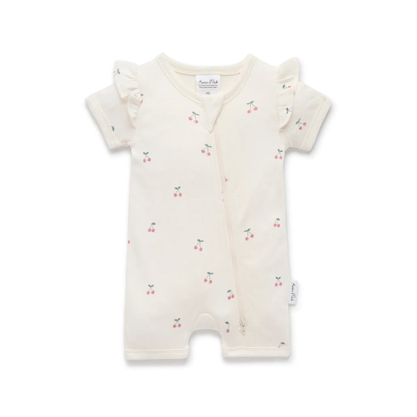 Baby romper with cherry pattern on a white background