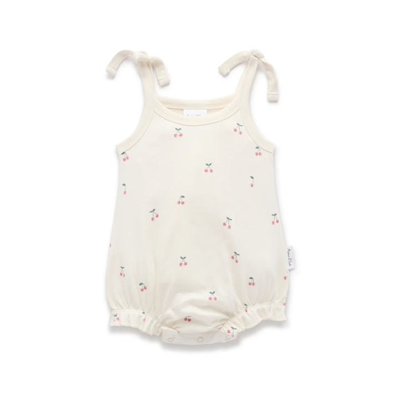 Baby romper with cherry pattern on a white background