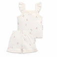 Baby outfit set with ruffled top and shorts on a white background