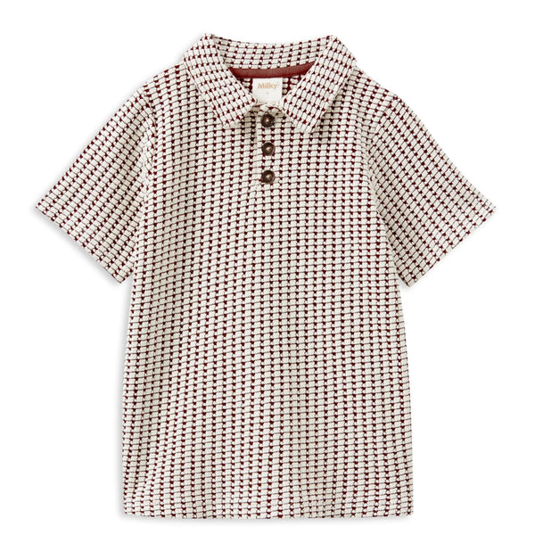 Checkered shirt with buttons on a white background