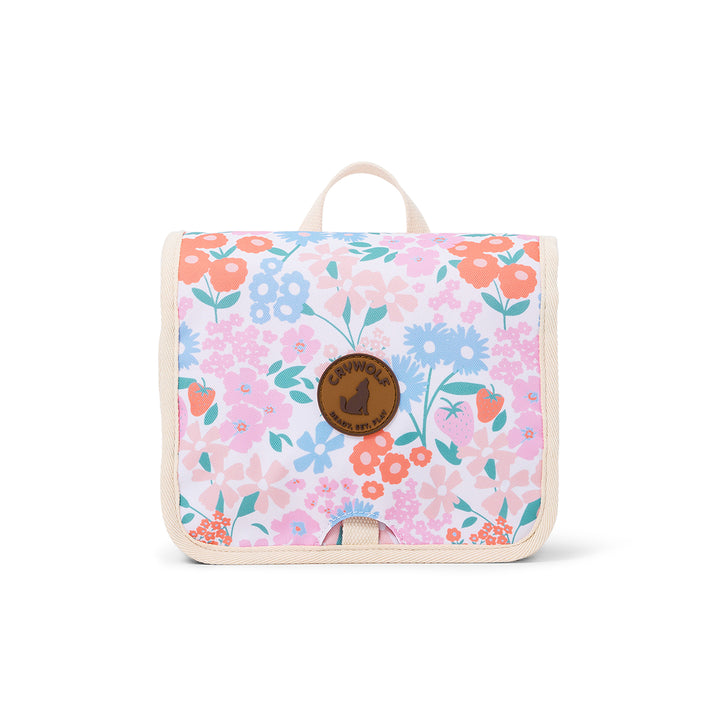 Floral-patterned toilet bag with a visible brand logo on a white background