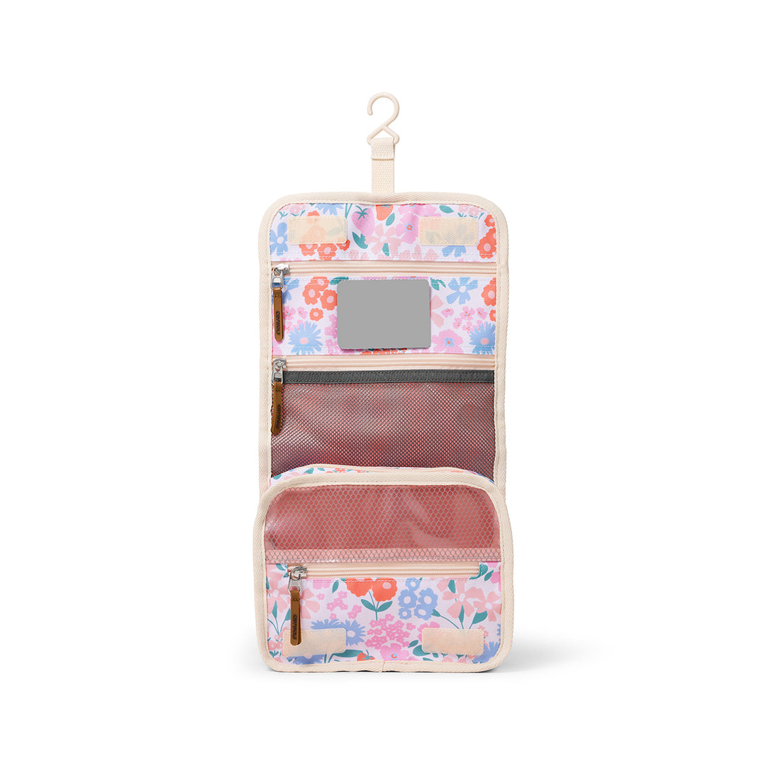 Floral-patterned hanging travel organizer on a white background