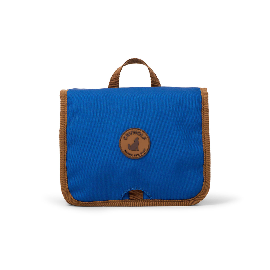 Blue toilet bag with brown trim and logo on a white background