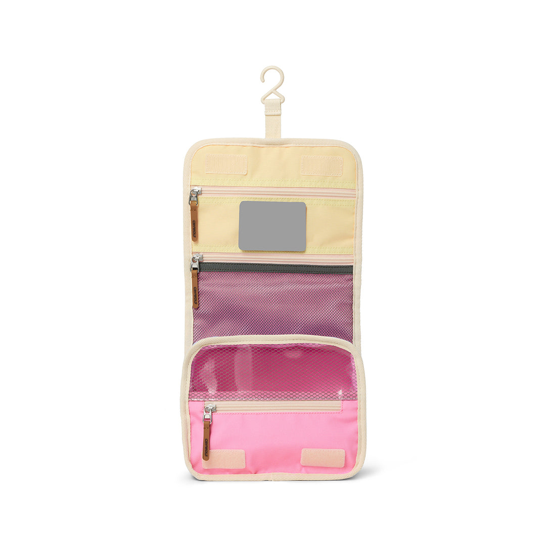 Multicolored hanging toiletry bag with compartments on a white background