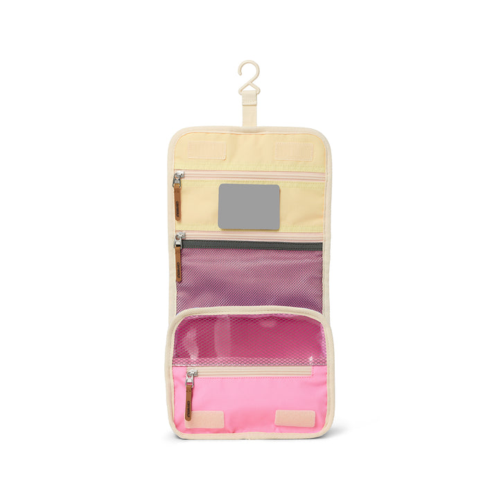 Multicolored hanging toiletry bag with compartments on a white background