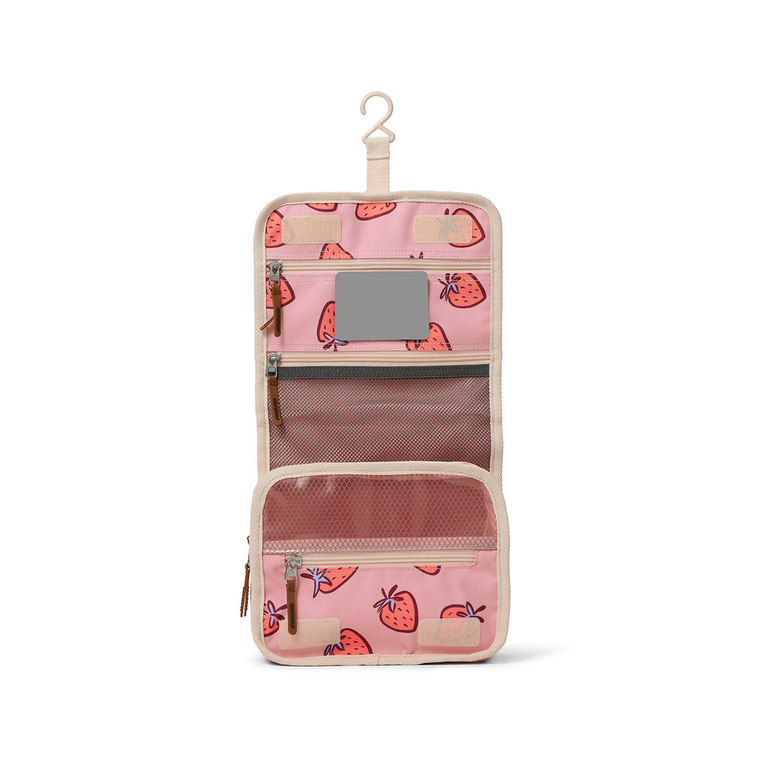 Pink travel organizer with strawberry pattern on a white background